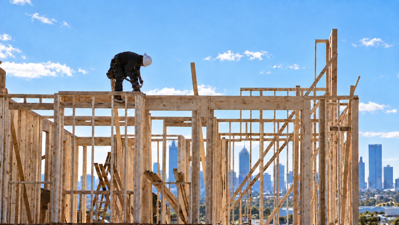 Carpenter working on timber framing